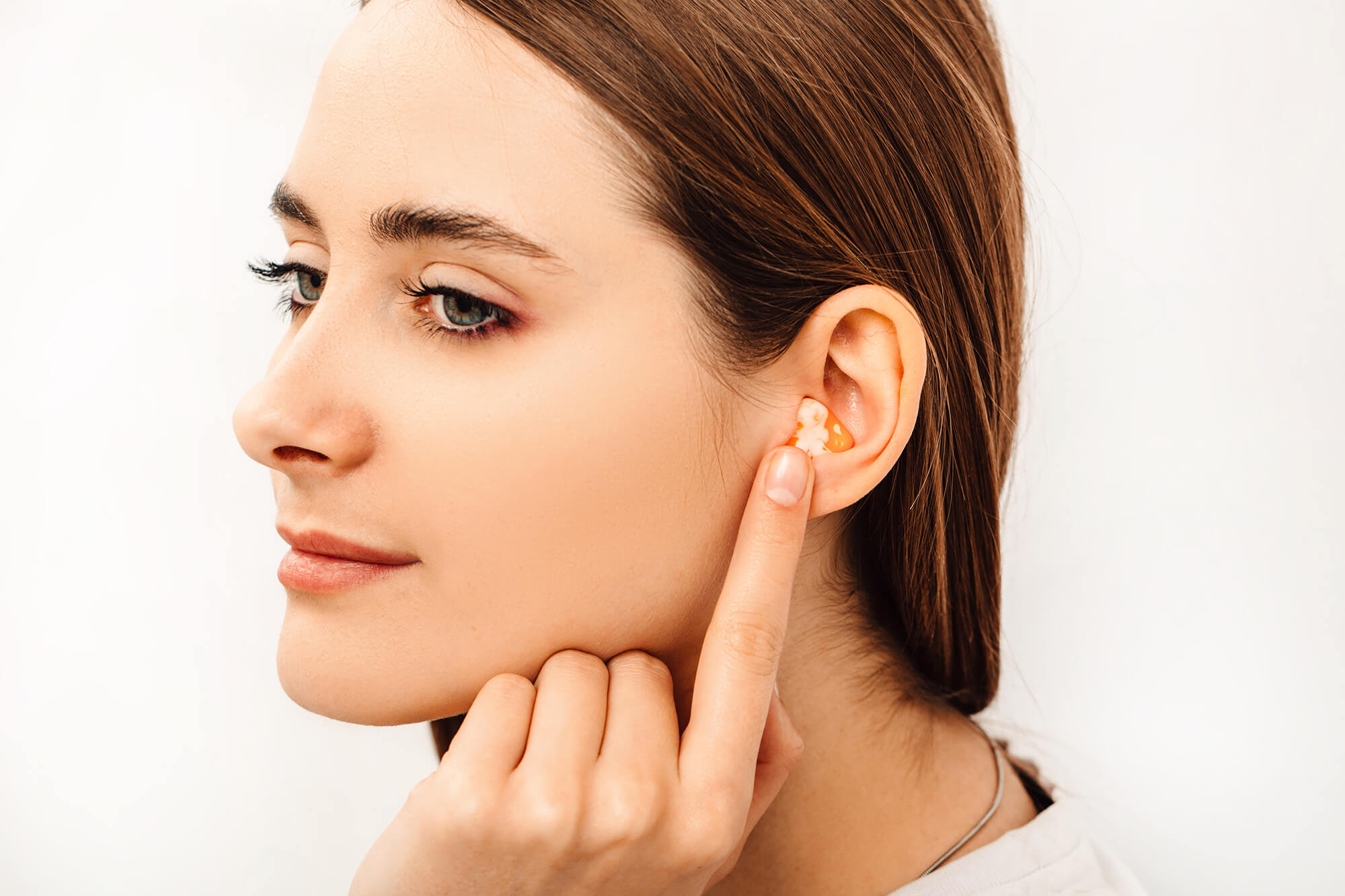 Young woman with custom earplug